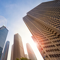 Picture of skyscrapers from the street view looking up